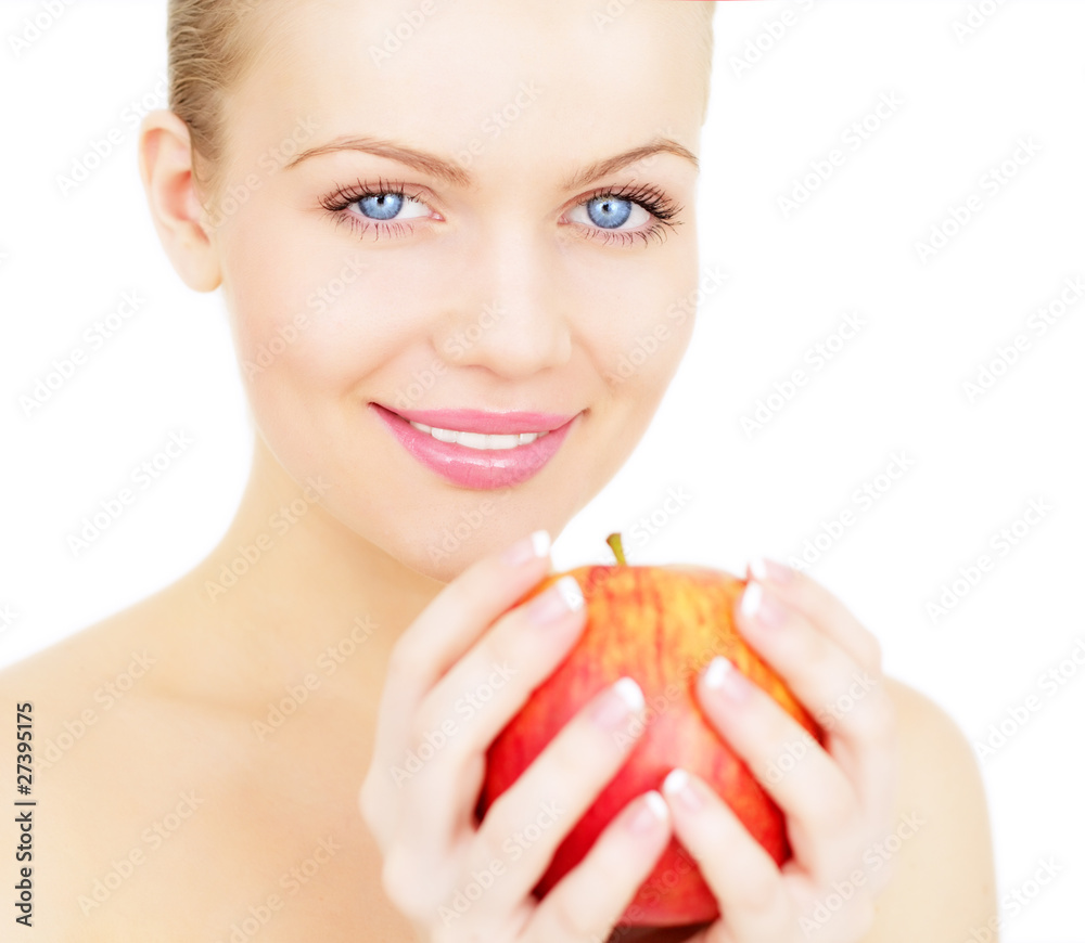 Beautiful girl holding a red apple isolated on white background Beautiful girl holding a red apple isolated on white background