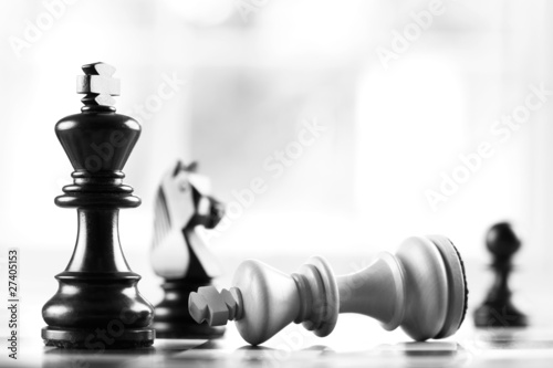 checkmate black defeats white king photo