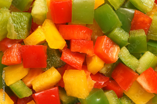 Slices of green, yellow and red bell pepper
