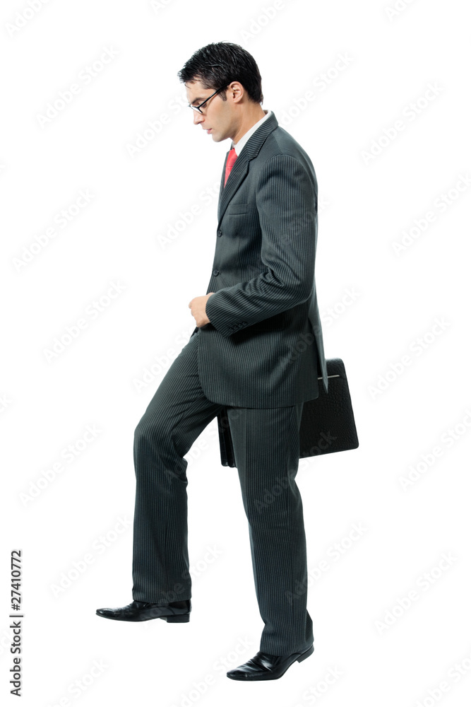 Walking businessman with briefcase, isolated on white Walking businessman with briefcase, isolated on white