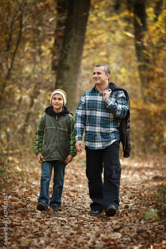 Father and son taking a walk outdoor