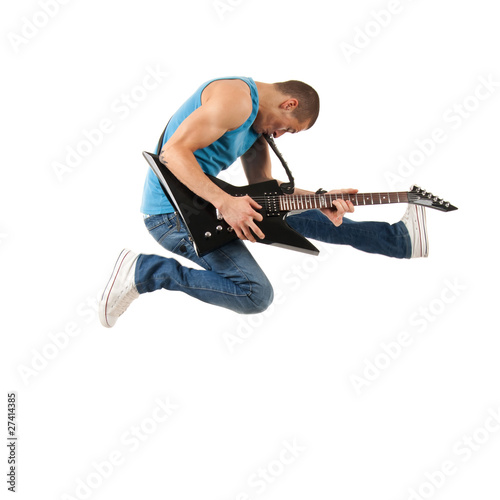 guitarist jumps in the air