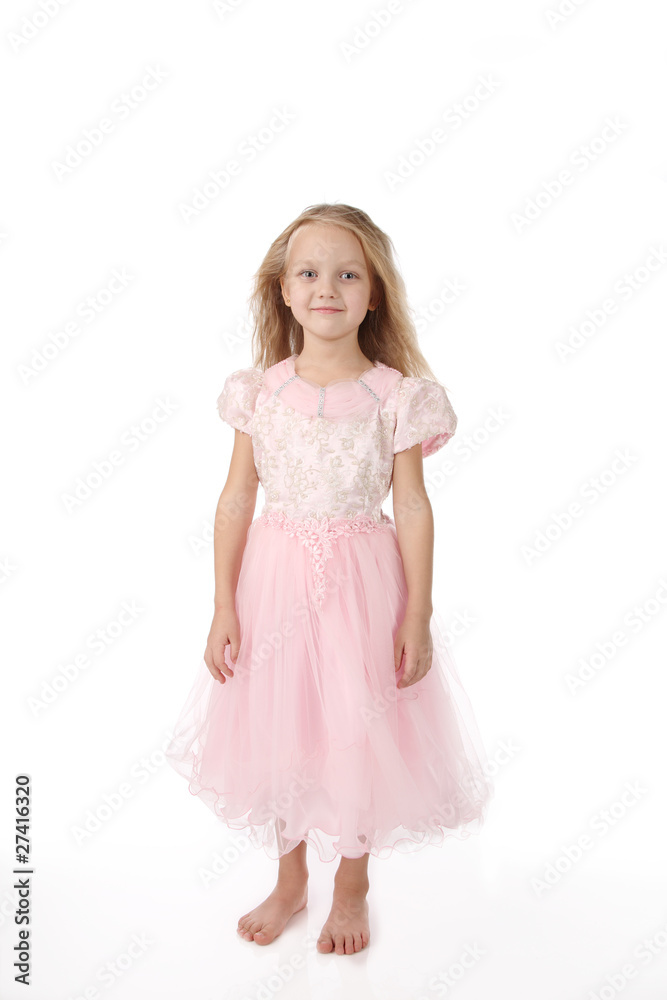 little girl in a pink elegant dress.White background