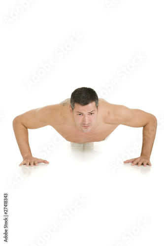 bare-chested man does push-ups