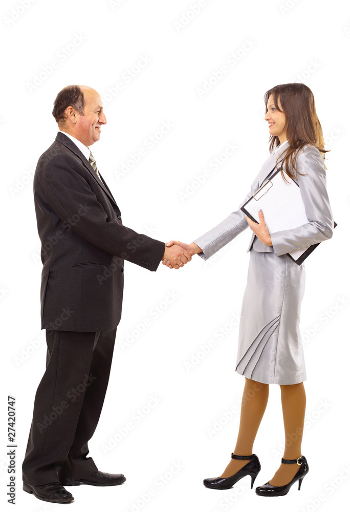 young man shaking hands with a woman against