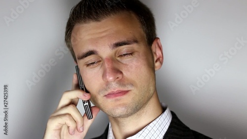 young man talking on mobile phone