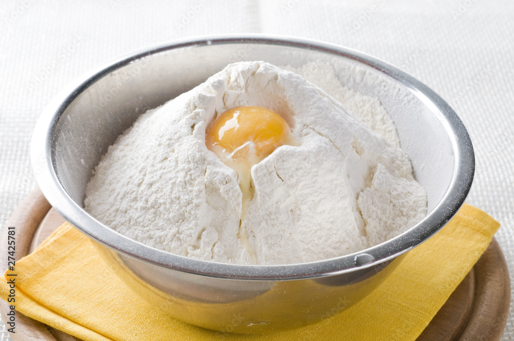 White flour and egg  in bowl