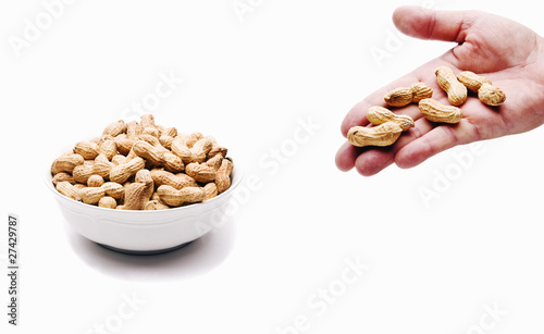 Peanut Bowl and Hand Full of Nuts