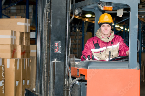 warehouse worker in stacker