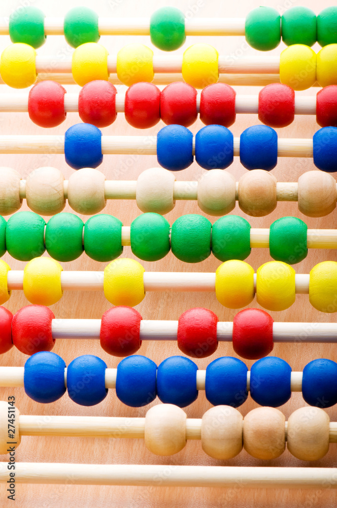 Education concept - Abacus with many colorful beads Education concept - Abacus with many colorful beads