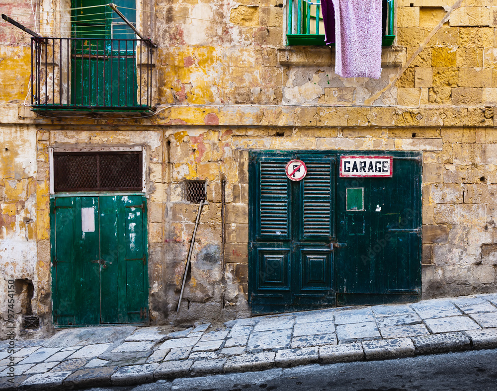 Naklejka premium Old green fringed doors