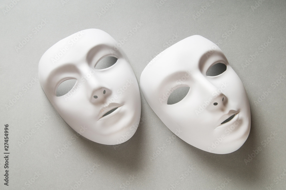 Theatre concept with the white plastic masks Theatre concept with the white plastic masks
