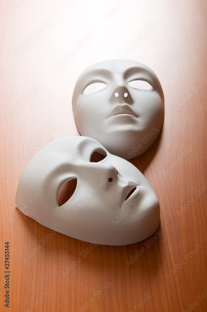 Theatre concept with the white plastic masks Theatre concept with the white plastic masks