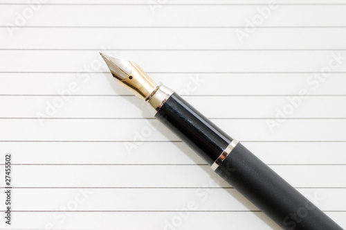 Elegant fountain pen on paper with clipping path