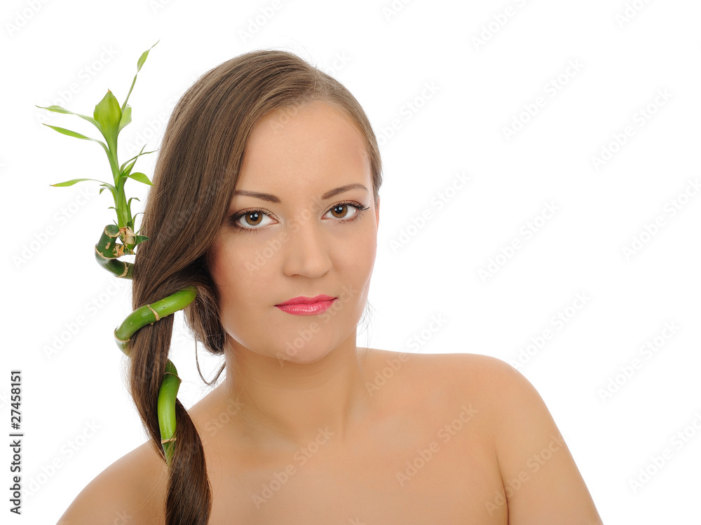 Beautiful spa woman with long healthy hair and pure skin with a Beautiful spa woman with long healthy hair and pure skin with a
