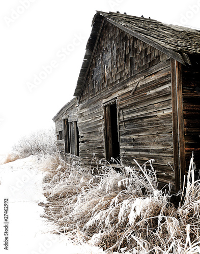 Abandoned Wood Farm Building in Winter
