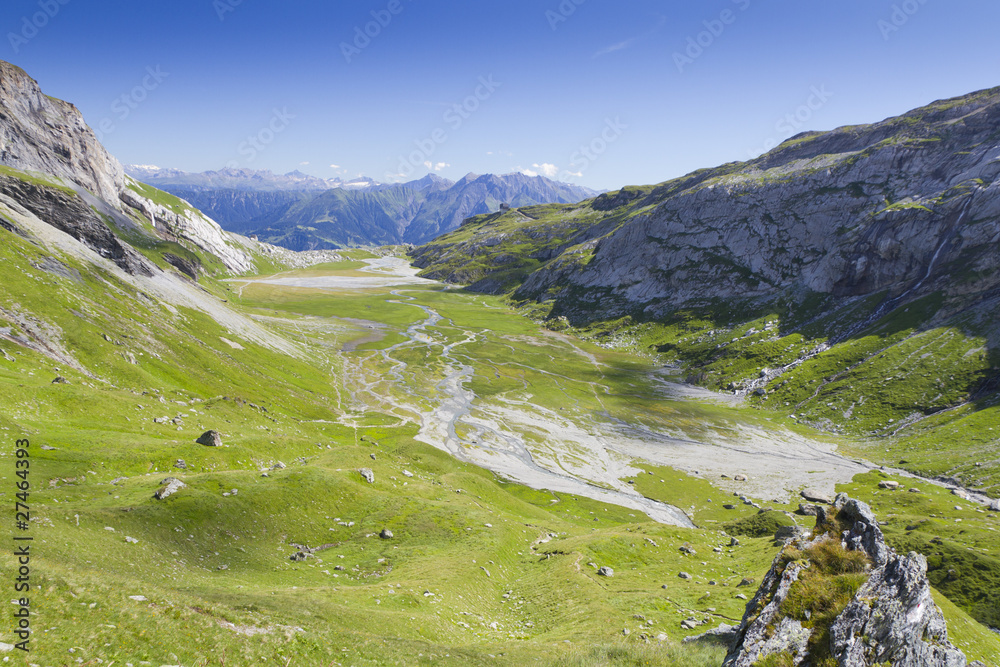 flat green alpine valley