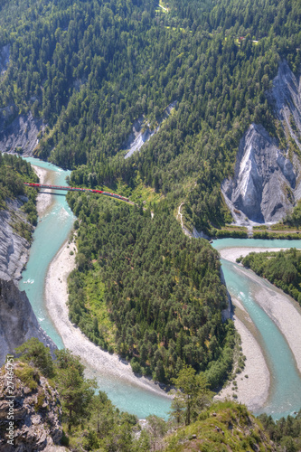 Glacier Express crosses bridge and Rhine bend