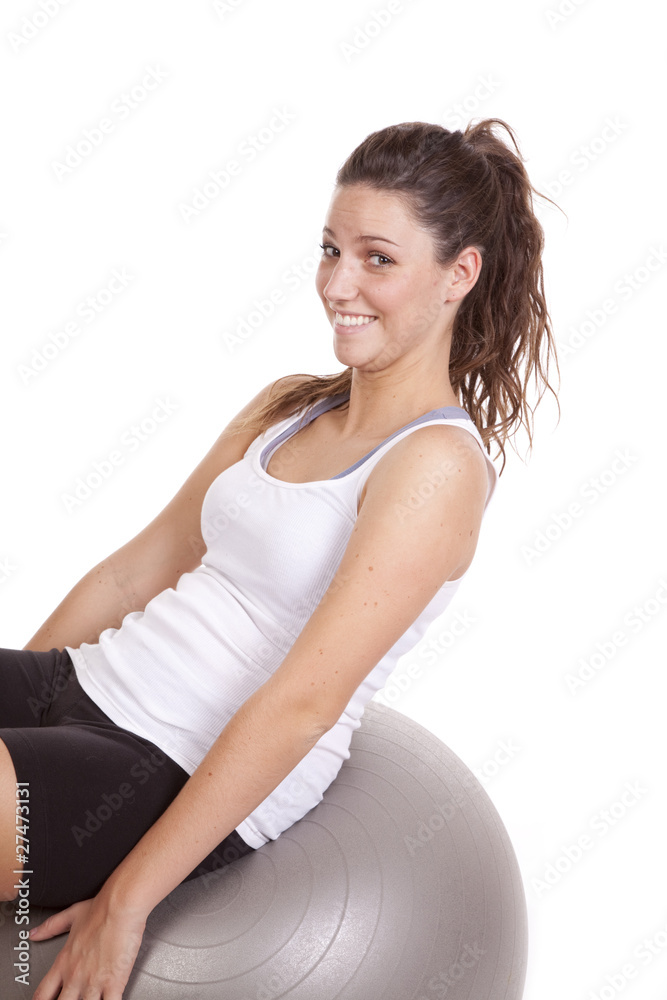 Woman leaning back on fitness ball Woman leaning back on fitness ball