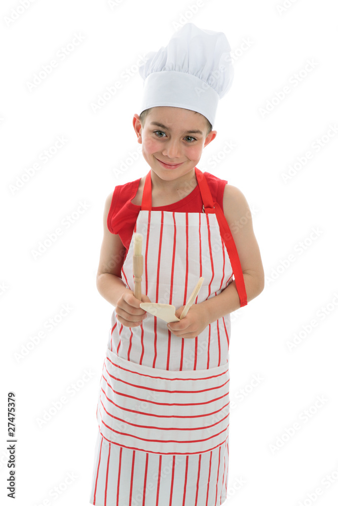 Smiling chef holding kitchen utensils Smiling chef holding kitchen utensils