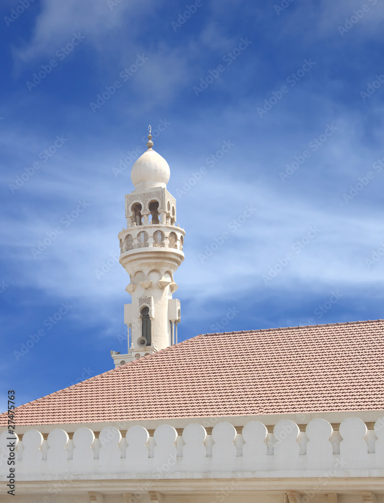 Beautiful Minaret of Sheikh Isa Bin Ali Mosque on blue sky