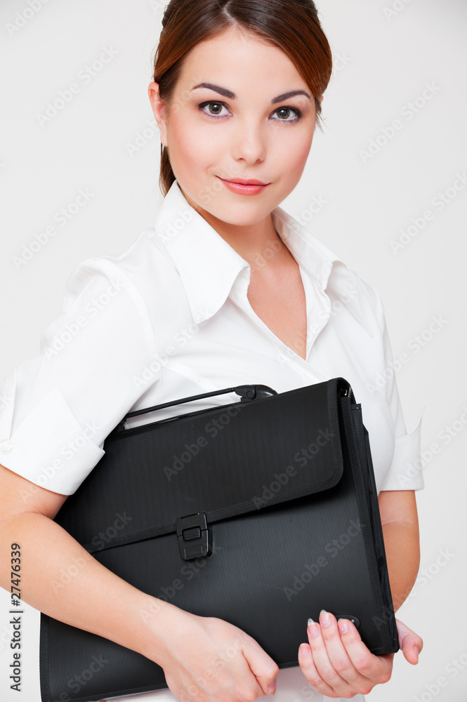 assured businesswoman with black briefcase assured businesswoman with black briefcase