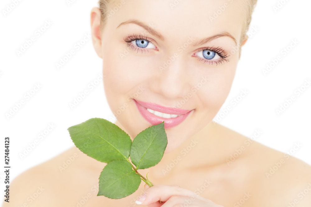 Beautiful girl holding a twig isolated on a white background Beautiful girl holding a twig isolated on a white background