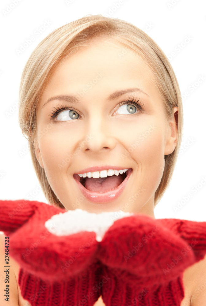beautiful woman in red mittens with snow beautiful woman in red mittens with snow