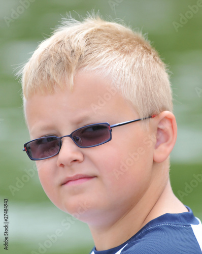 Juvenile Boy with Sunglasses