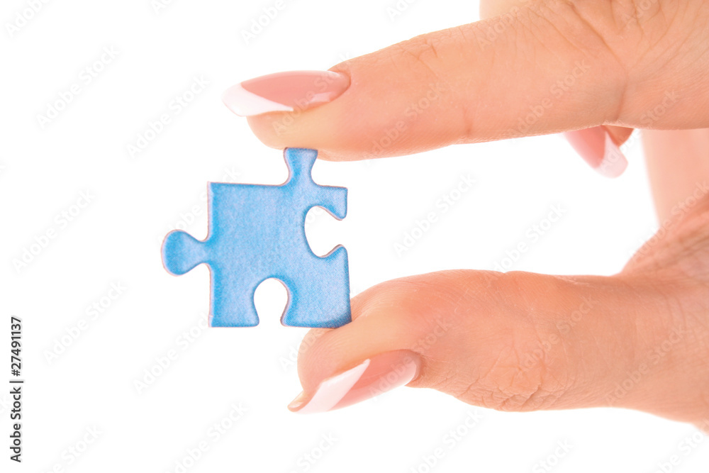 Hand with puzzle isolated on white Hand with puzzle isolated on white