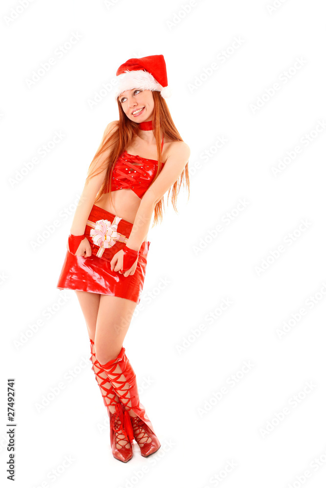 Beautiful redhead woman with Christmas present in hands isolated Beautiful redhead woman with Christmas present in hands isolated