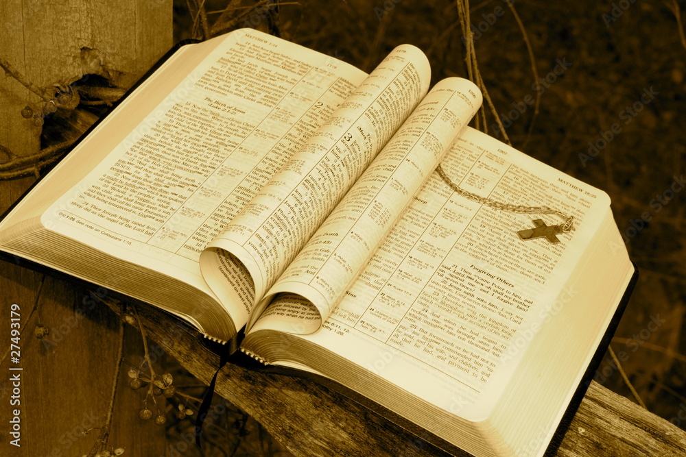 Fototapeta premium Bible with Heart and Cross