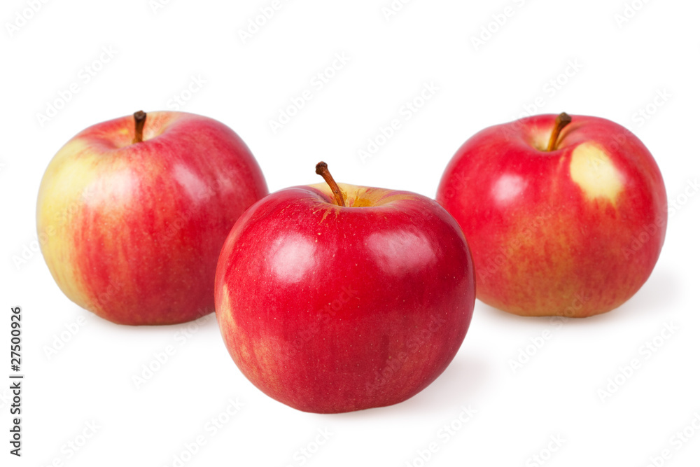 Three red apples isolated on the white Three red apples isolated on the white