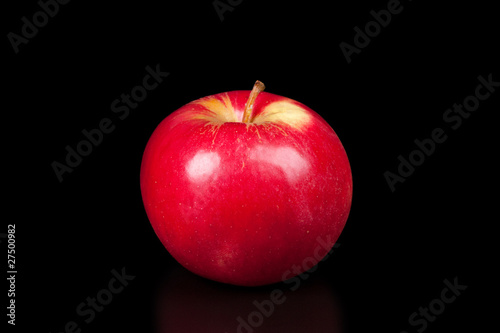 red apple isolated on black