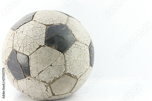 Old soccer ball on white © guidenop