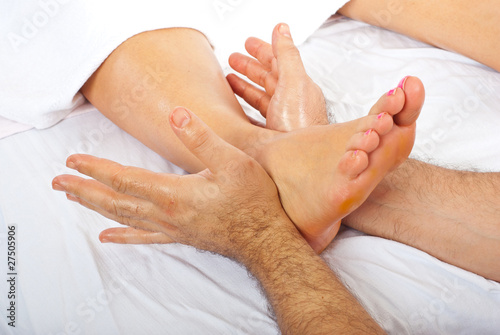 Detail of massage of foot photo