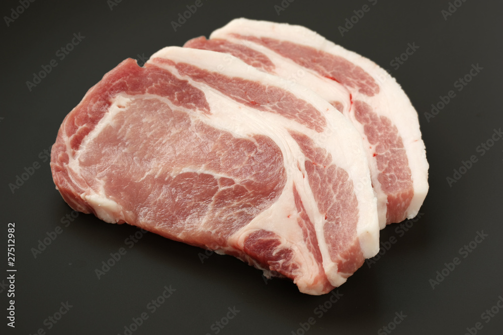 slices of fresh raw pork loin