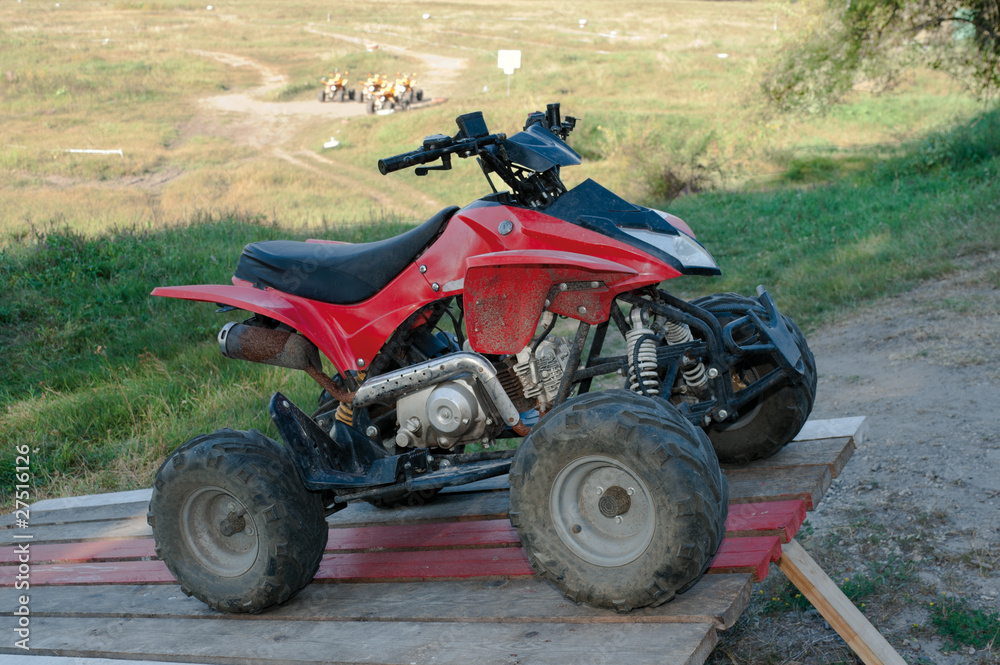 Small dirt all-terrain vehicle by the contest field Small dirt all-terrain vehicle by the contest field