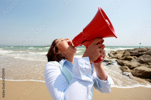 Young Woman Using Megaphone. Model Released photo