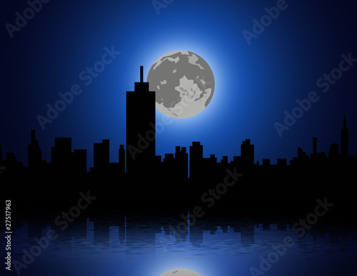 full moon and a city