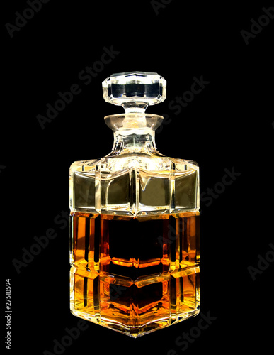 A crystal decanter with whiskey