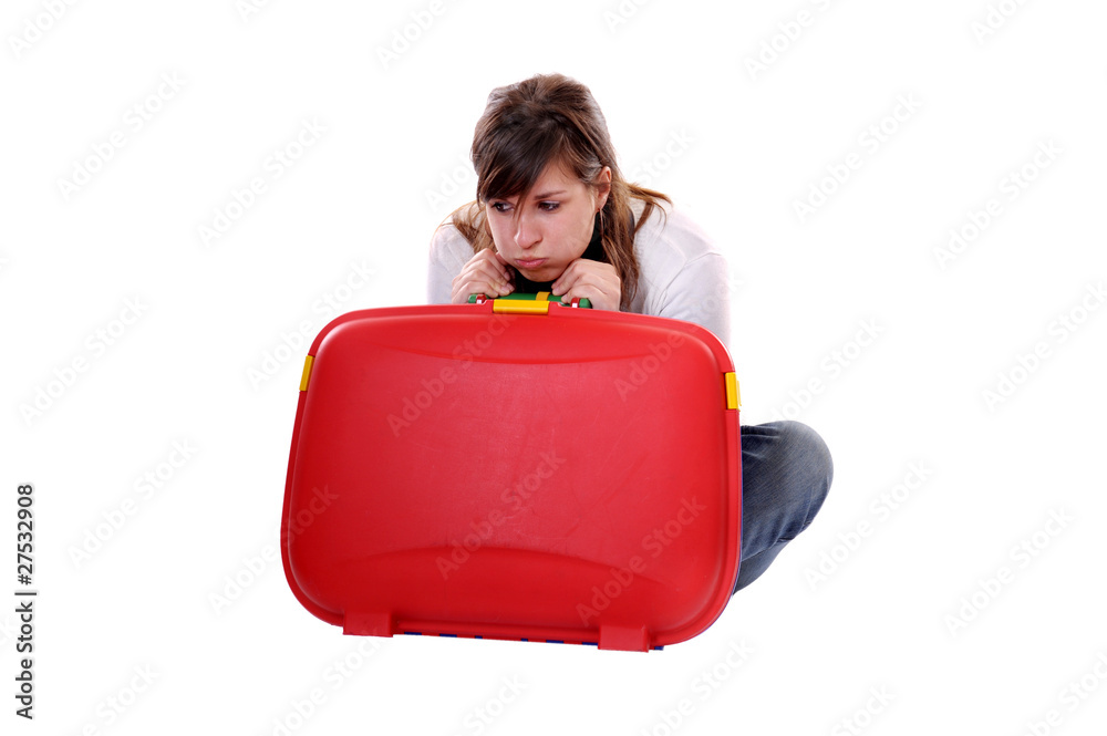 Travel concept young bored woman with suitcase Travel concept young bored woman with suitcase