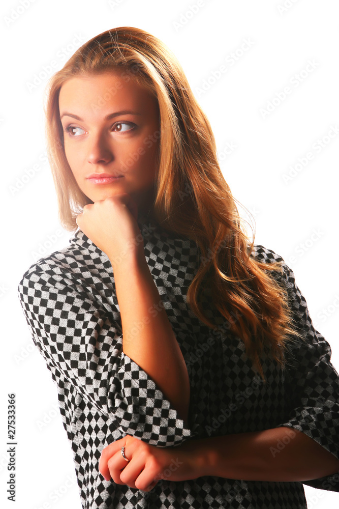 Blonde girl in a checkered dress on a white background Blonde girl in a checkered dress on a white background