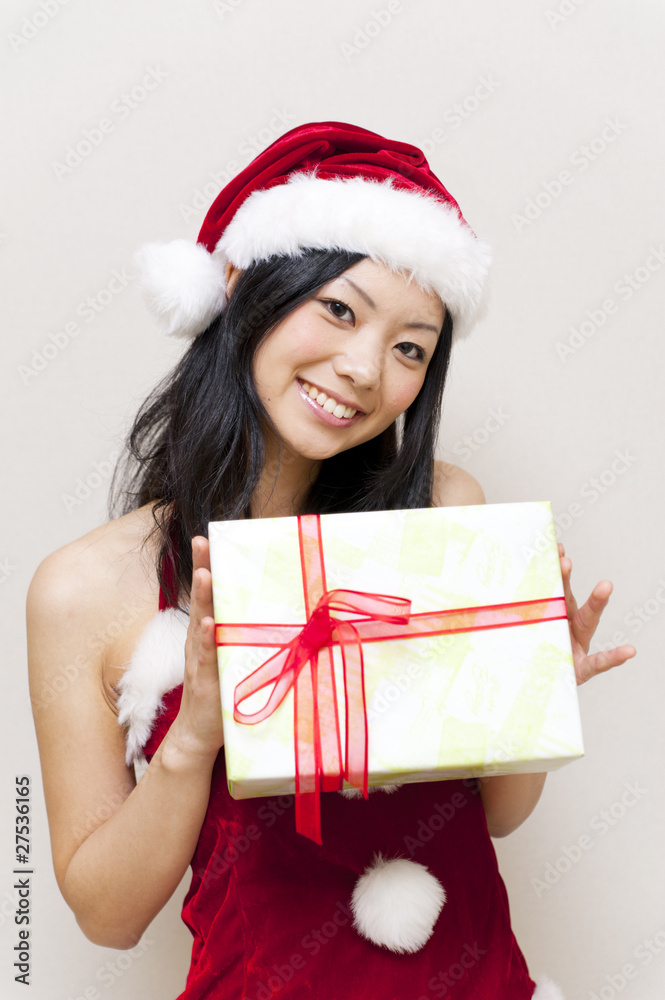 a portrait of santa woman taking present a portrait of santa woman taking present