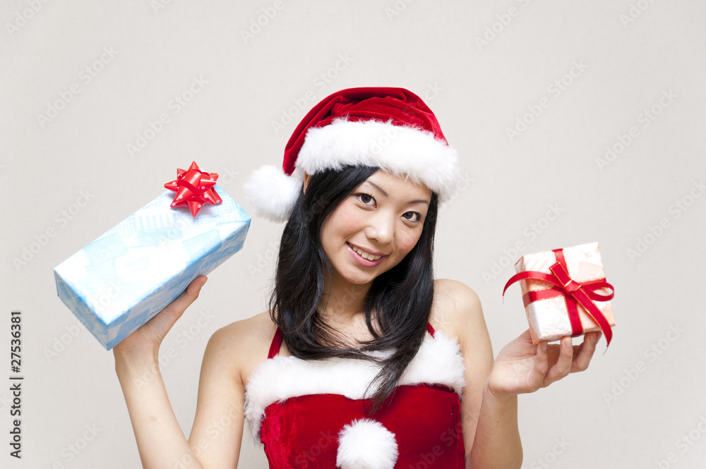 a portrait of santa woman taking present a portrait of santa woman taking present