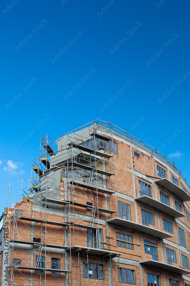 residential building construction site on a lovely summer day (c