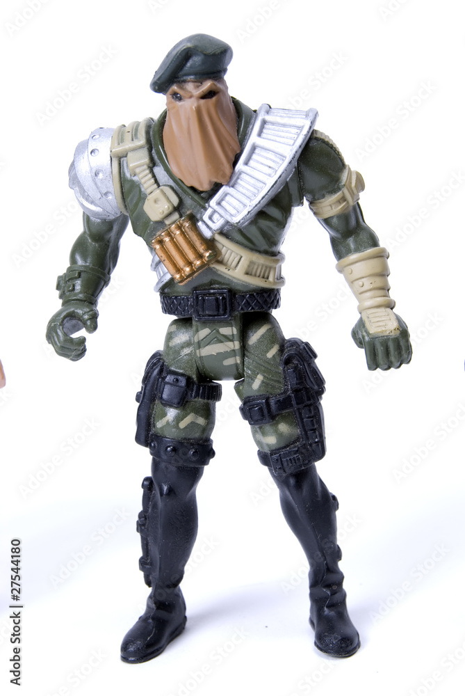 toy soldier in camouflage   over white background