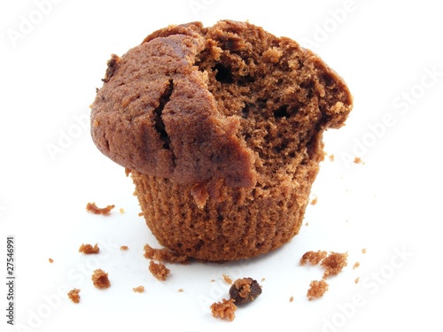 Chocolate chip muffin - bite missing & crumbs photo