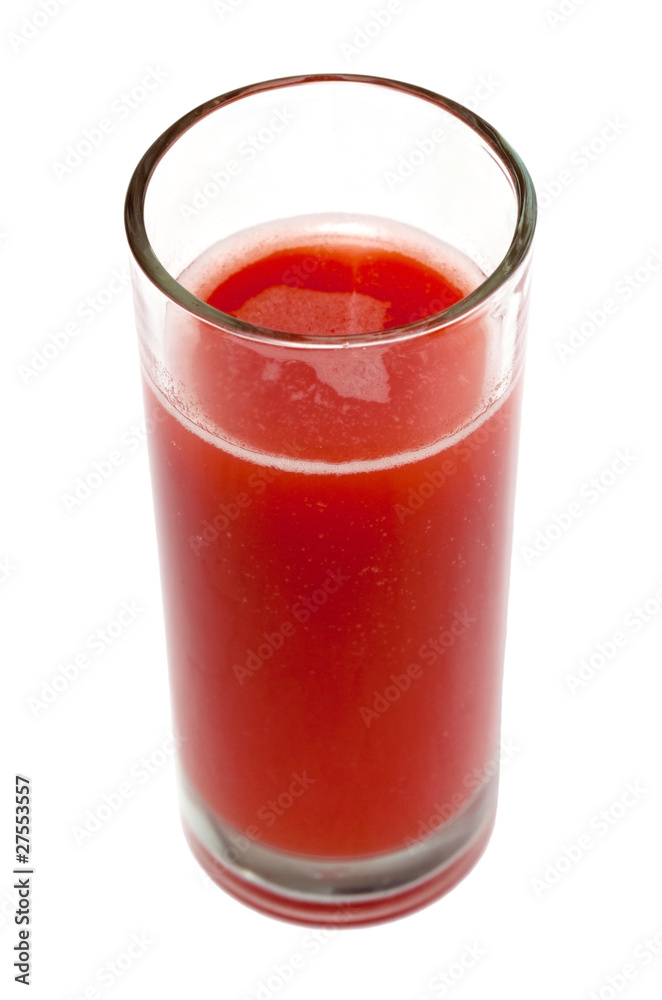 Tomato juice in clear glass isolated on white background Tomato juice in clear glass isolated on white background