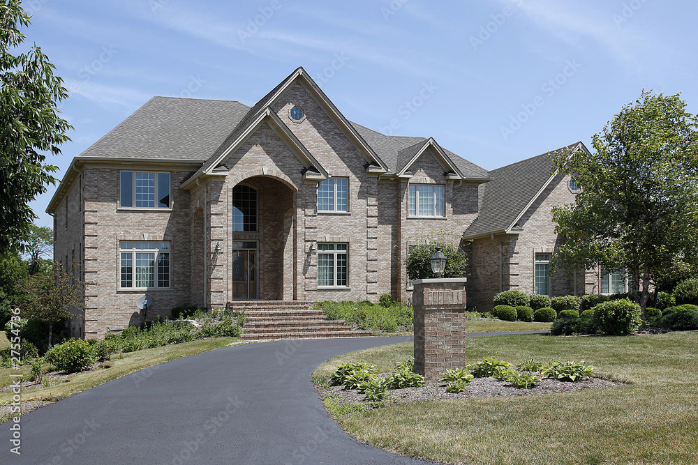 Large brick home with arched entry Large brick home with arched entry